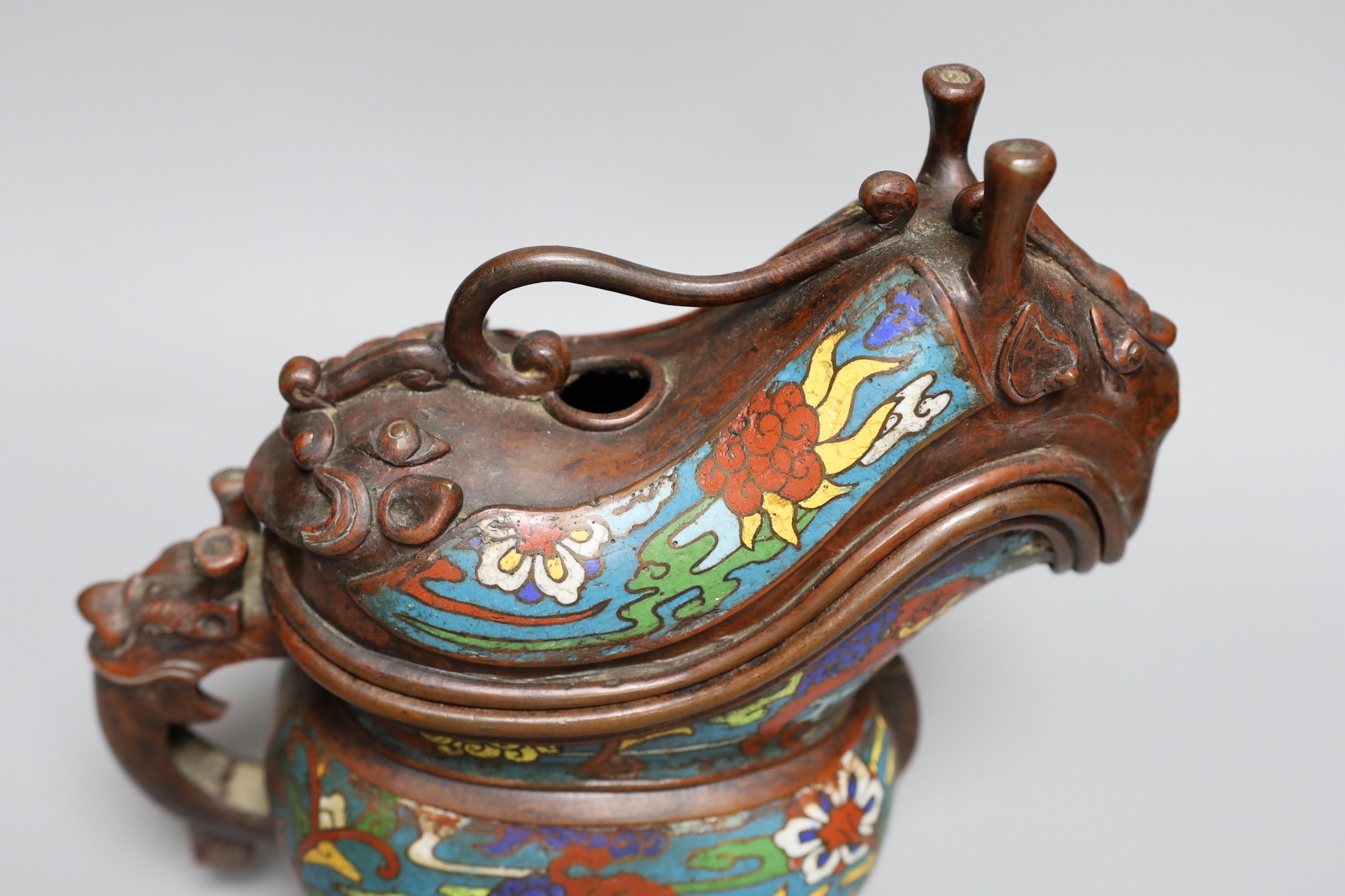 A Japanese champleve enamel and bronze archaistic vessel, 26cms high